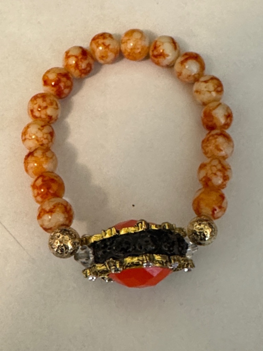 Gold-Accent Orange Beaded Stretch Bracelet with Faceted Center